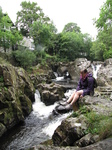 SX23132 Jenni on rocks by Afon Conwy at Betws-Y-Coed.jpg